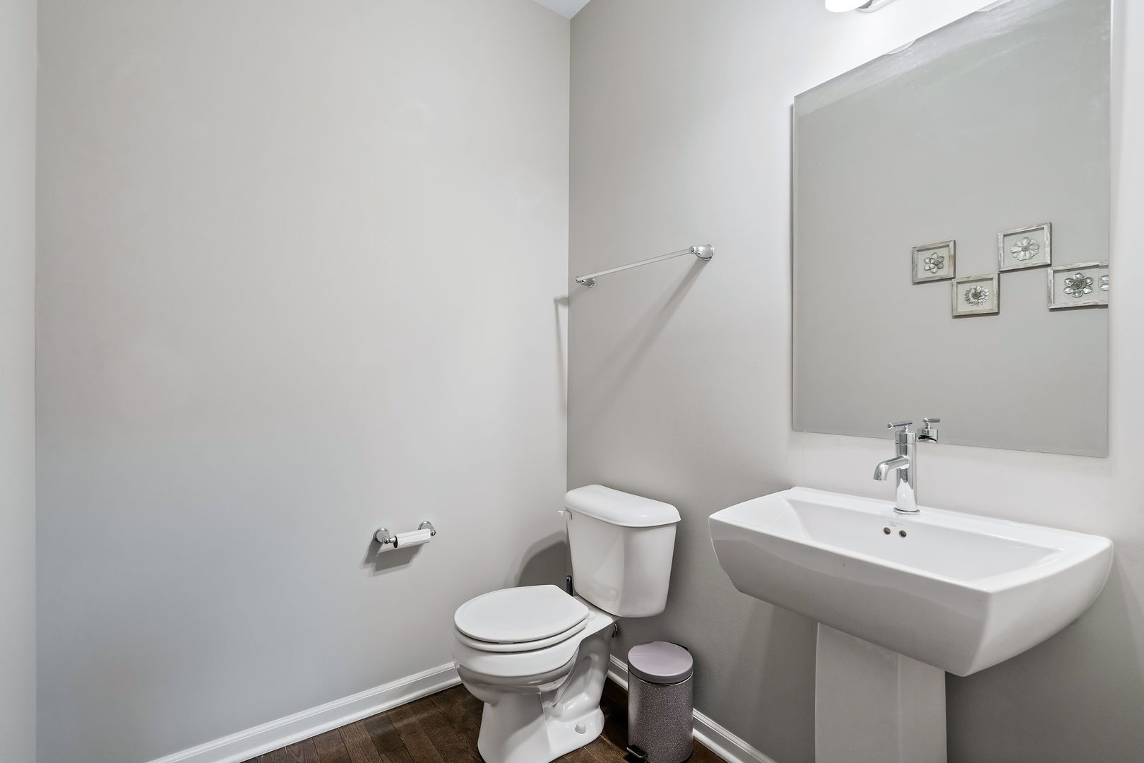 830 Center Street Des Plaines, IL 60016 - Photo 16 of 16 a bathroom with a sink toilet and a mirror