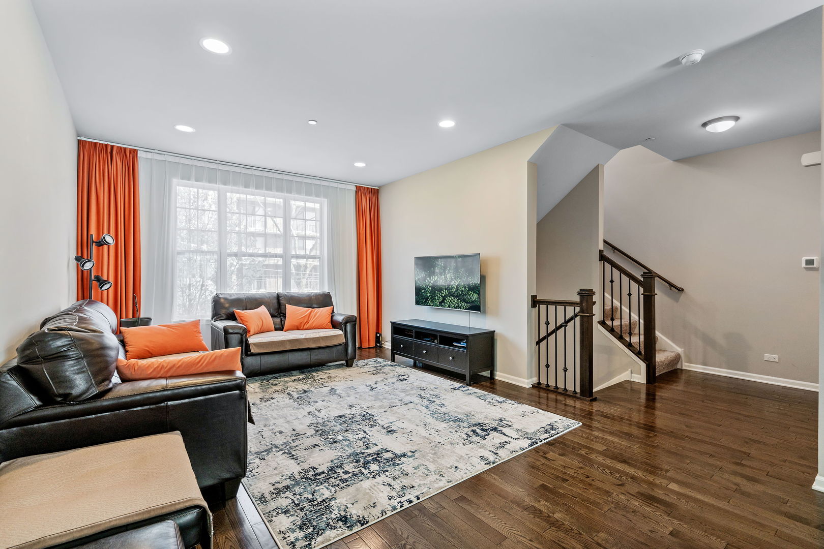 830 Center Street Des Plaines, IL 60016 - Photo 3 of 16 a living room with furniture and a wooden floor