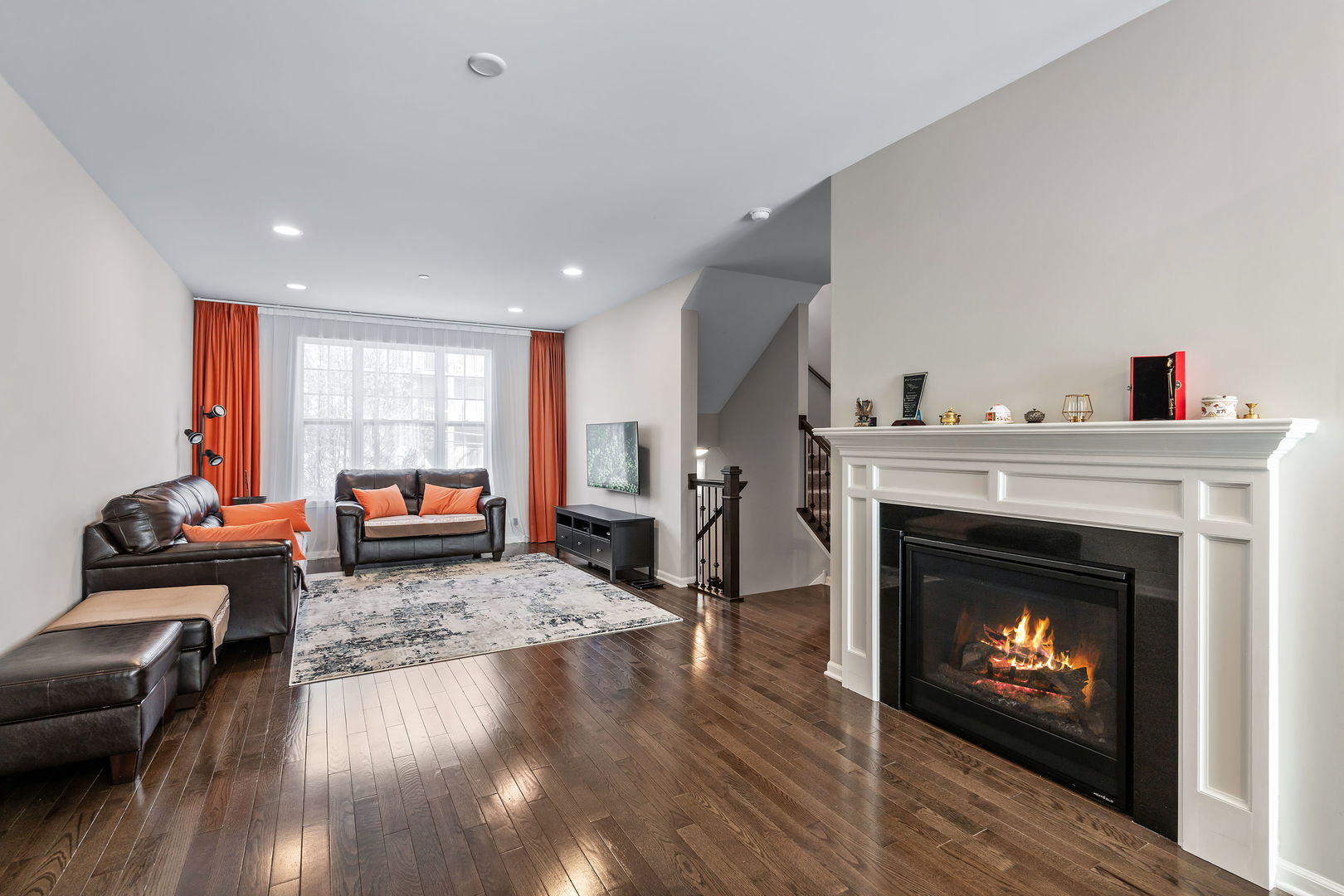 830 Center Street Des Plaines, IL 60016 - Photo 5 of 16 a living room with furniture fireplace and window