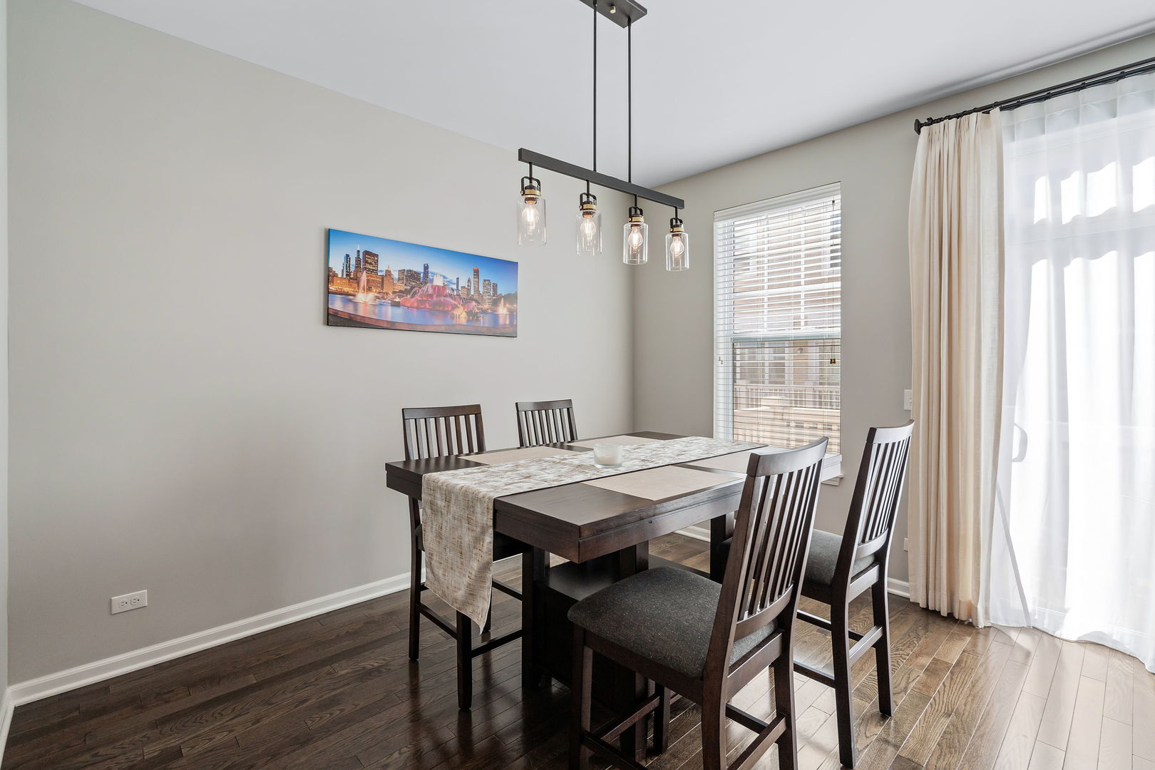 830 Center Street Des Plaines, IL 60016 - Photo 9 of 16 a view of a dining room with furniture window and wooden floor
