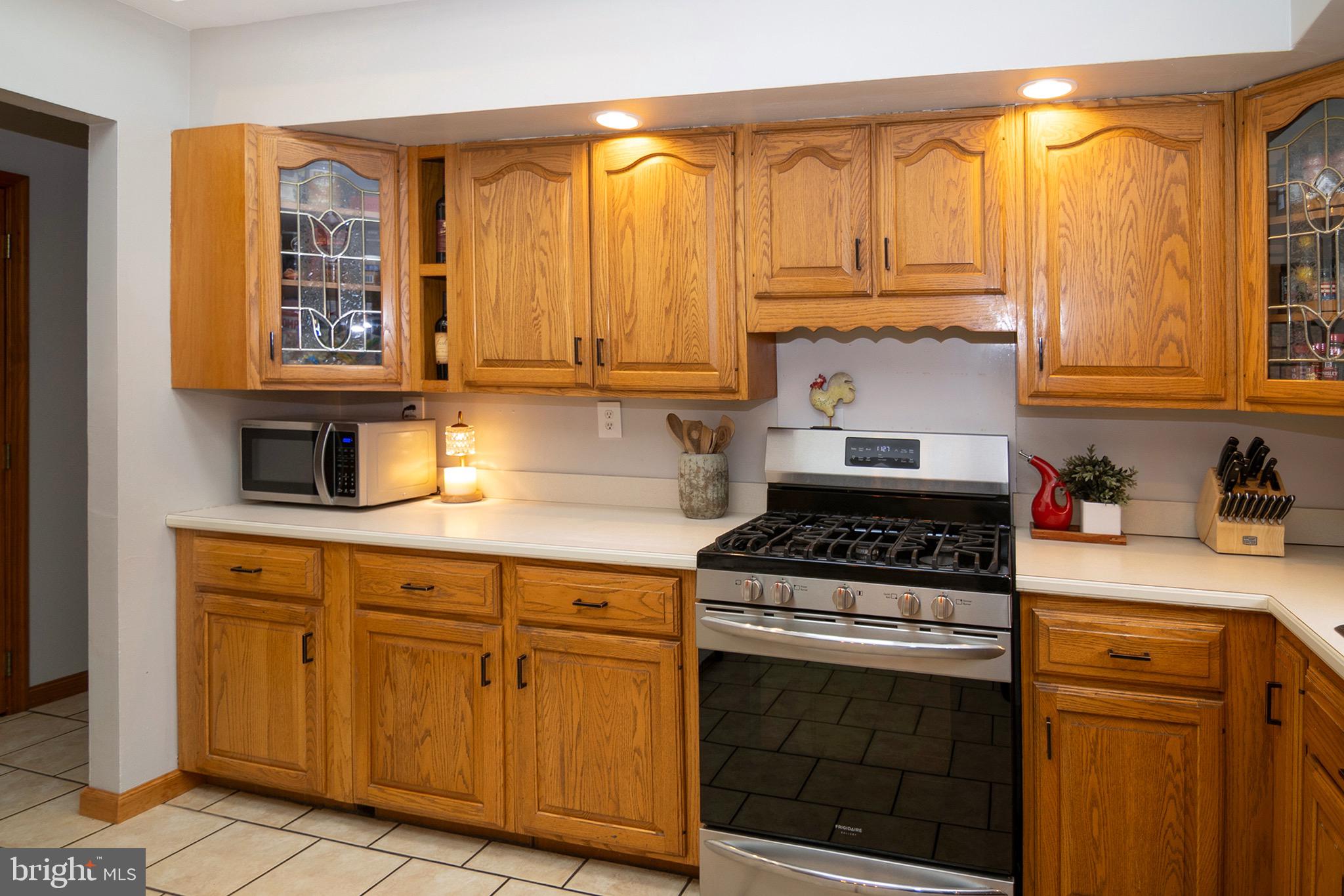 4643 Jackson Road Williamstown, NJ 08094 - Photo 18 of 74 a kitchen with cabinets appliances and a window