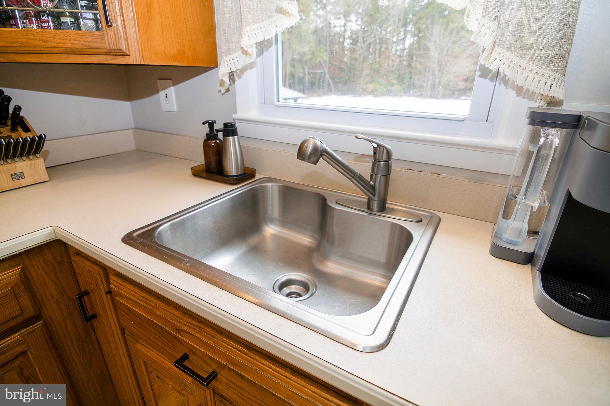 4643 Jackson Road Williamstown, NJ 08094 - Photo 20 of 74 a close view of sink and tap