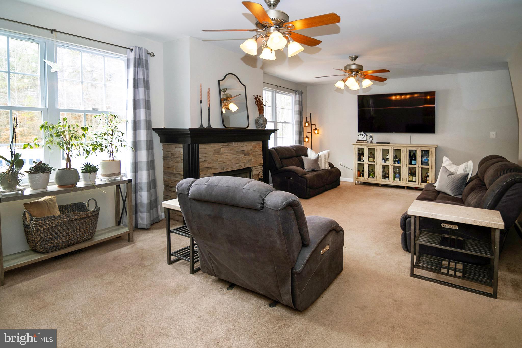 4643 Jackson Road Williamstown, NJ 08094 - Photo 22 of 74 a living room with furniture and a flat screen tv