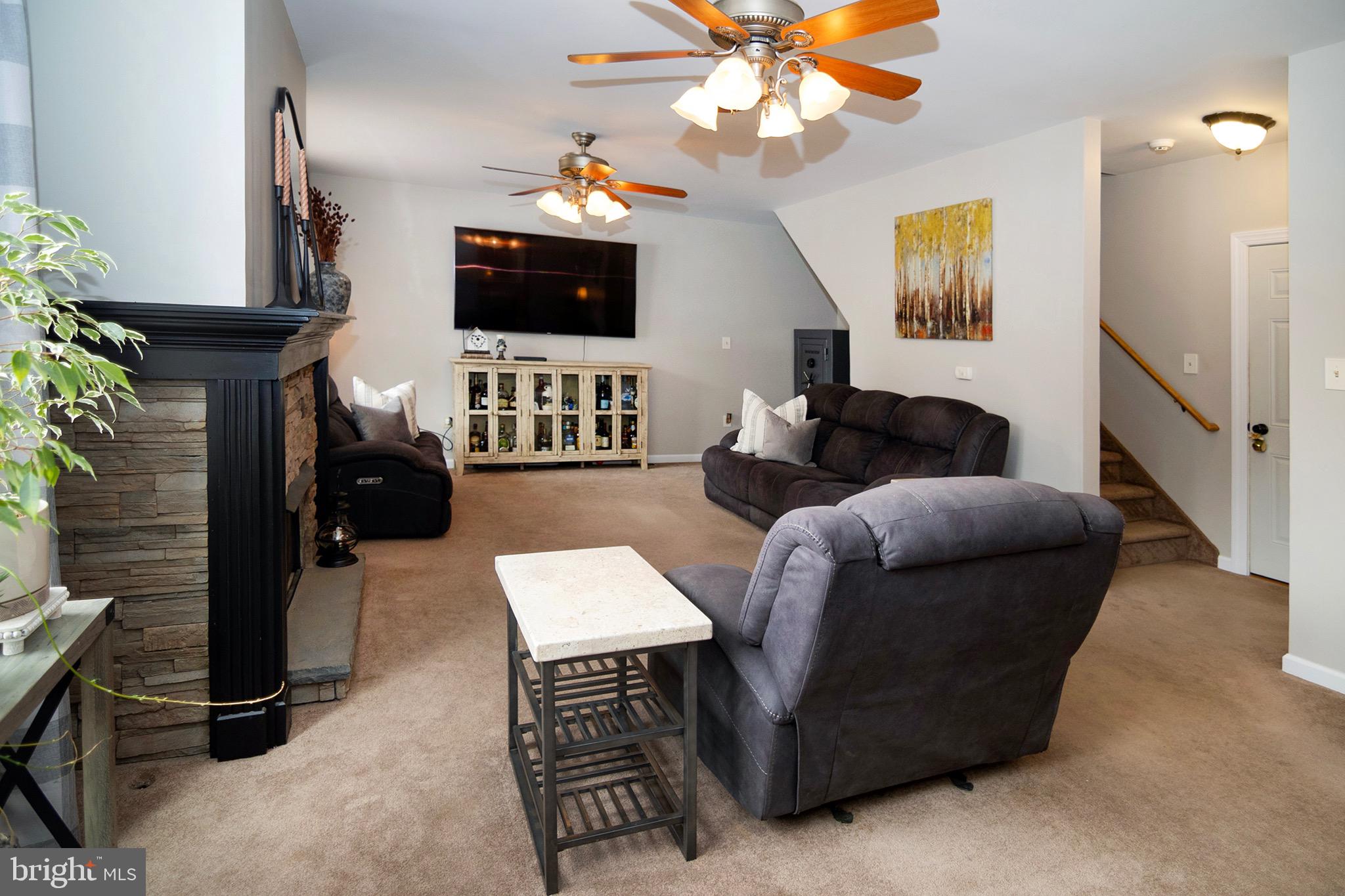 4643 Jackson Road Williamstown, NJ 08094 - Photo 23 of 74 a living room with furniture and a flat screen tv