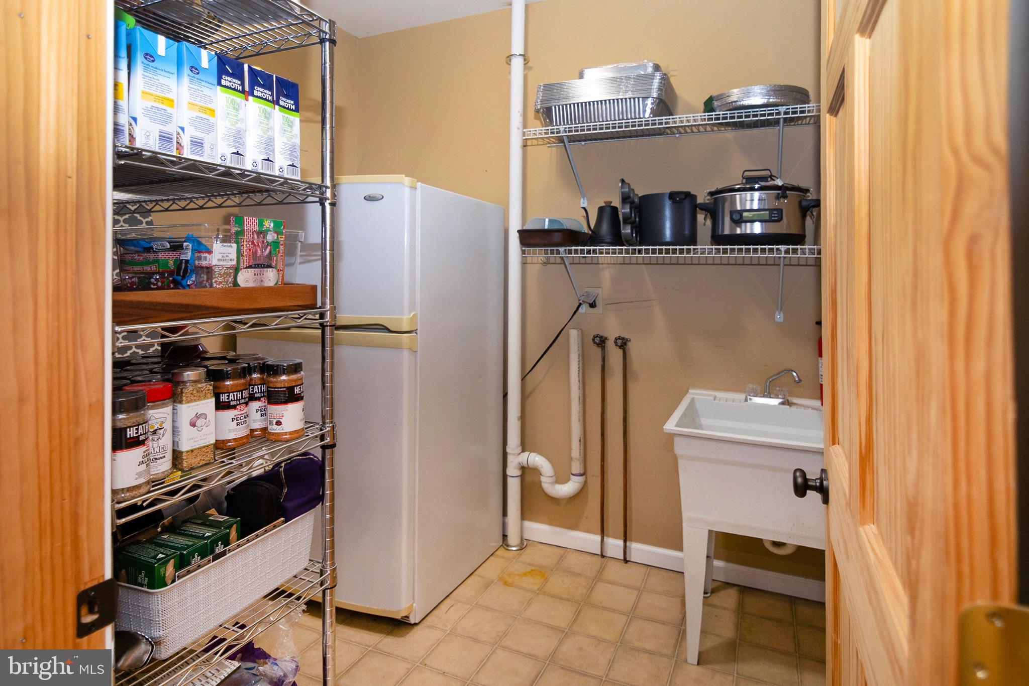 4643 Jackson Road Williamstown, NJ 08094 - Photo 26 of 74 a kitchen with a refrigerator and a window