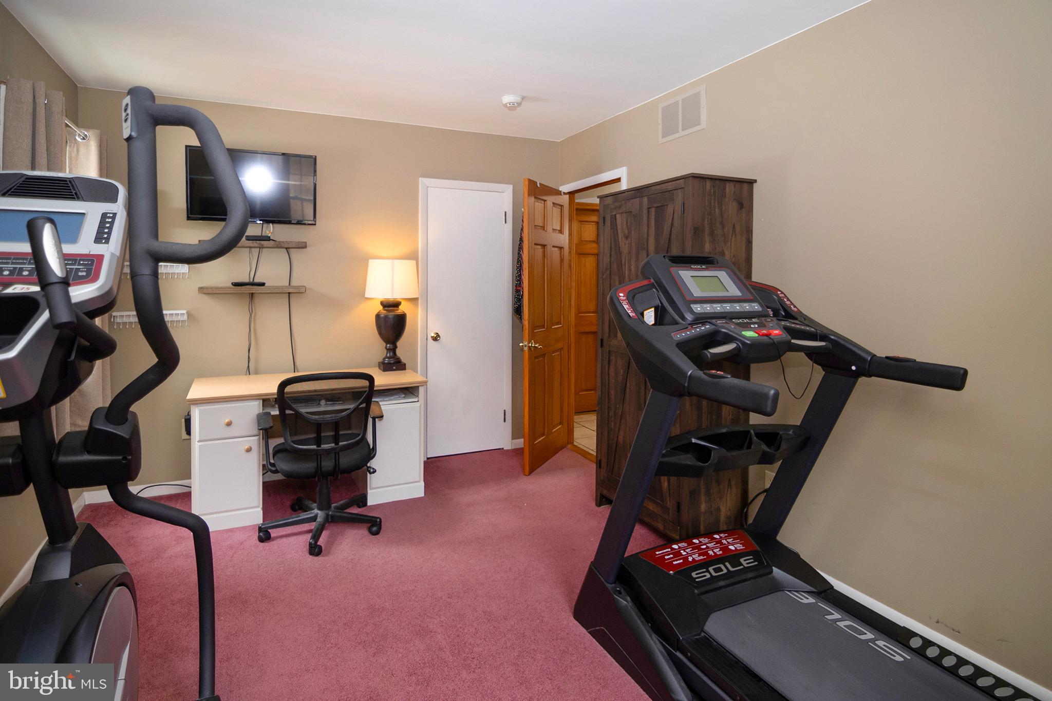 4643 Jackson Road Williamstown, NJ 08094 - Photo 36 of 74 a room with furniture and gym equipment