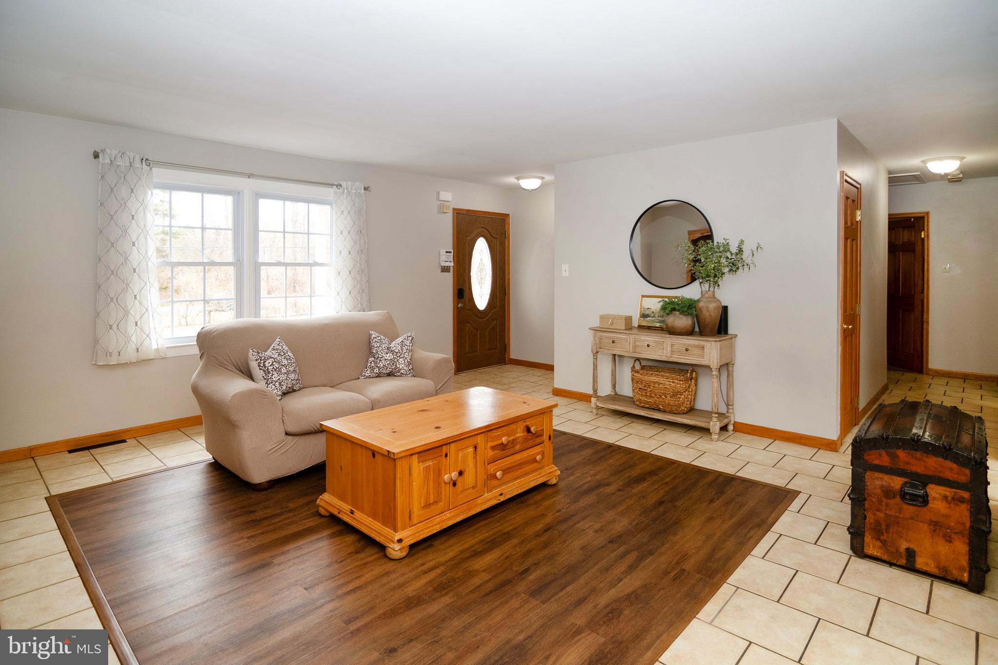 4643 Jackson Road Williamstown, NJ 08094 - Photo 8 of 74 a living room with furniture and a fireplace