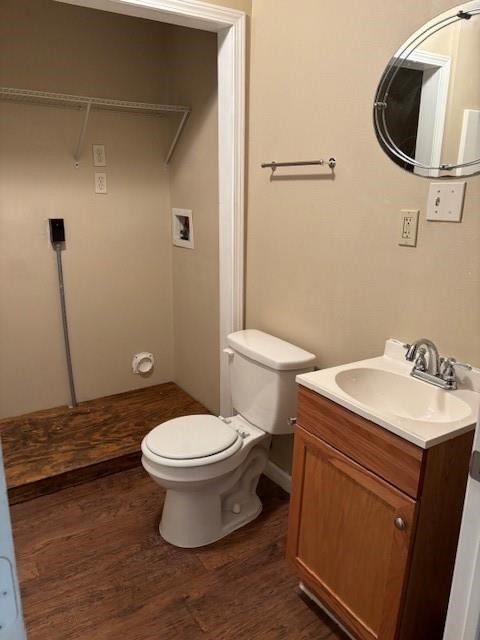 3521 Lebadie Street Houston, TX 77026 - Photo 8 of 9 a white toilet sitting next to a bathroom sink
