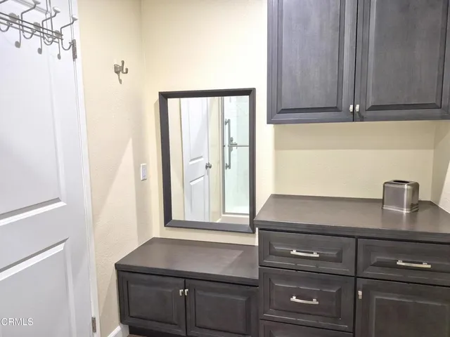 a close view of sink and cabinets