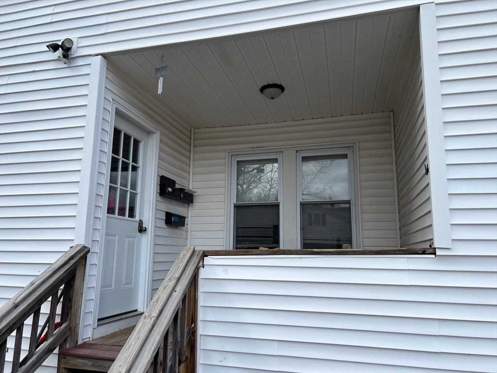 172 Chester Street Fitchburg, MA 01420 - Photo 20 of 22 a view of a house with a window