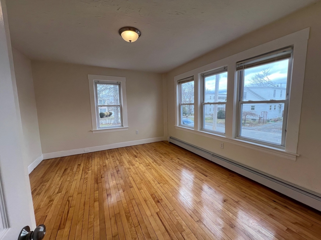 172 Chester Street Fitchburg, MA 01420 - Photo 5 of 22 a view of an empty room and window