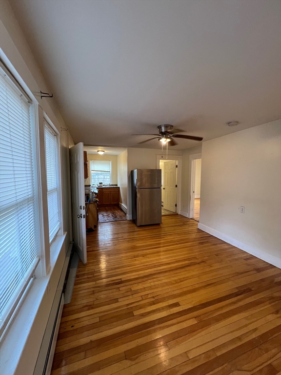 172 Chester Street Fitchburg, MA 01420 - Photo 10 of 22 a room with wooden floor and furniture