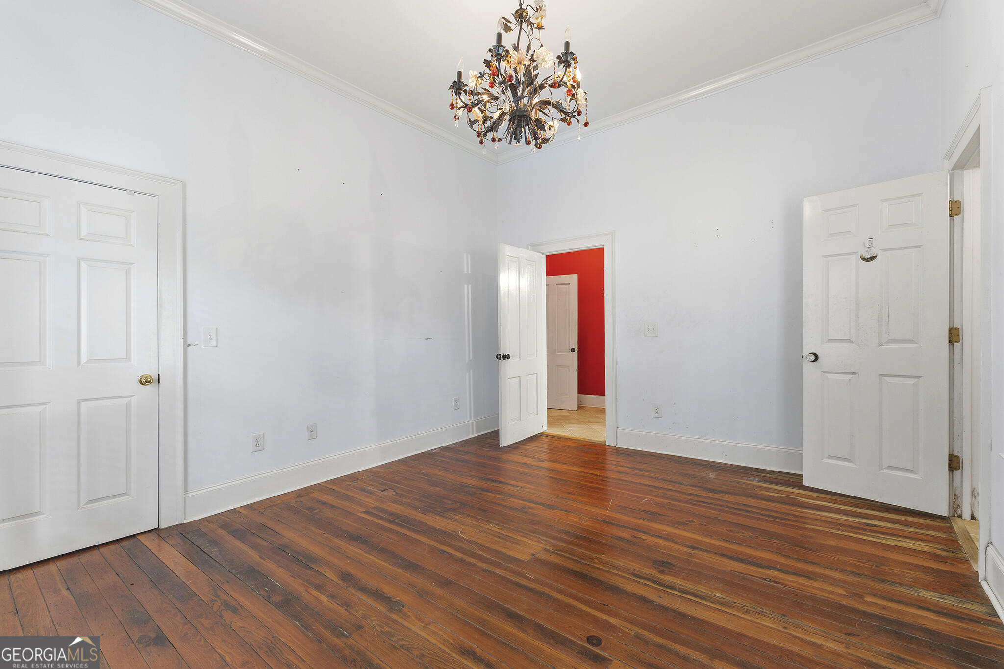 1469 Chestnut Street Macon, GA 31201 - Photo 14 of 26 a view of an empty room with wooden floor