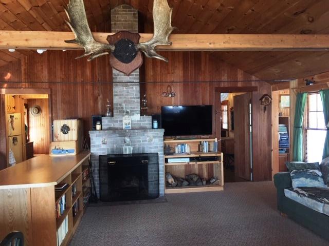 28 Lee Henry Road Rangeley, ME 04970 - Photo 5 of 47 Fireplace