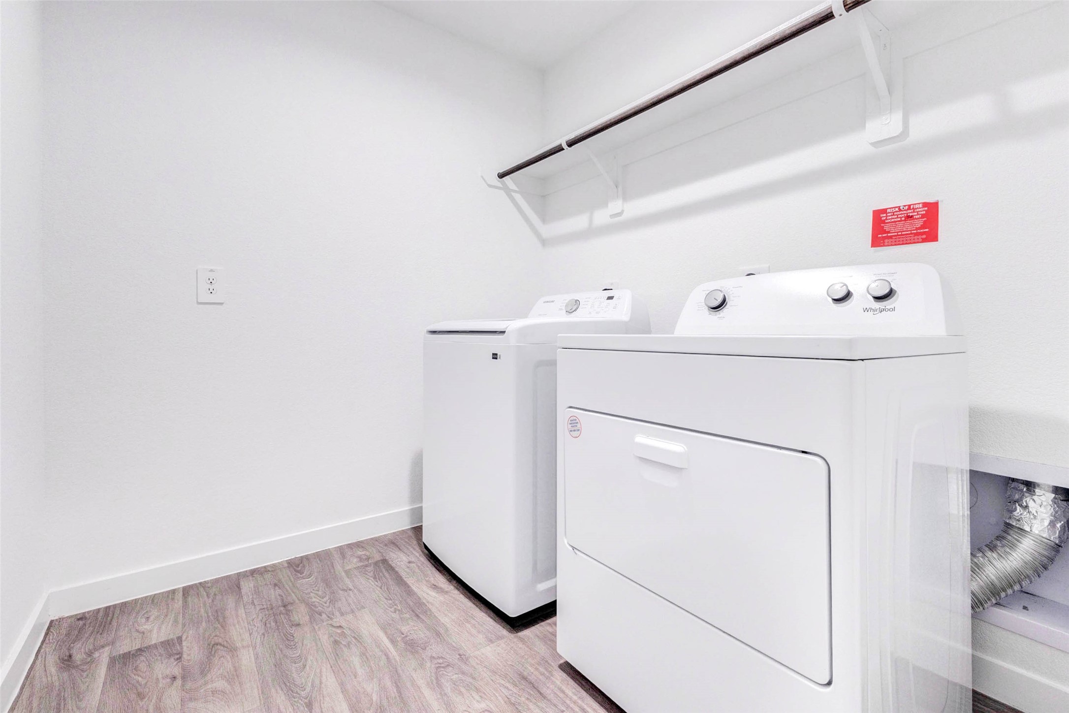 3903 Beltingham Bend Way Fulshear, TX 77441 - Photo 21 of 27 a utility room with dryer and washer