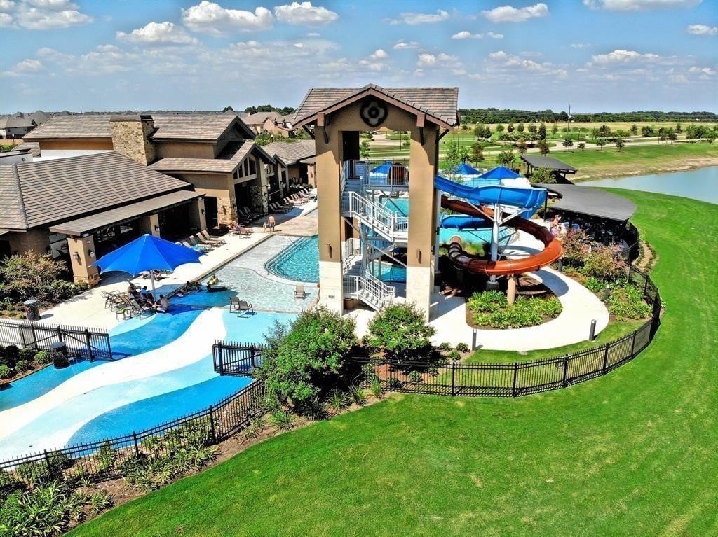 3903 Beltingham Bend Way Fulshear, TX 77441 - Photo 27 of 27 an aerial view of a house with a garden and outdoor space