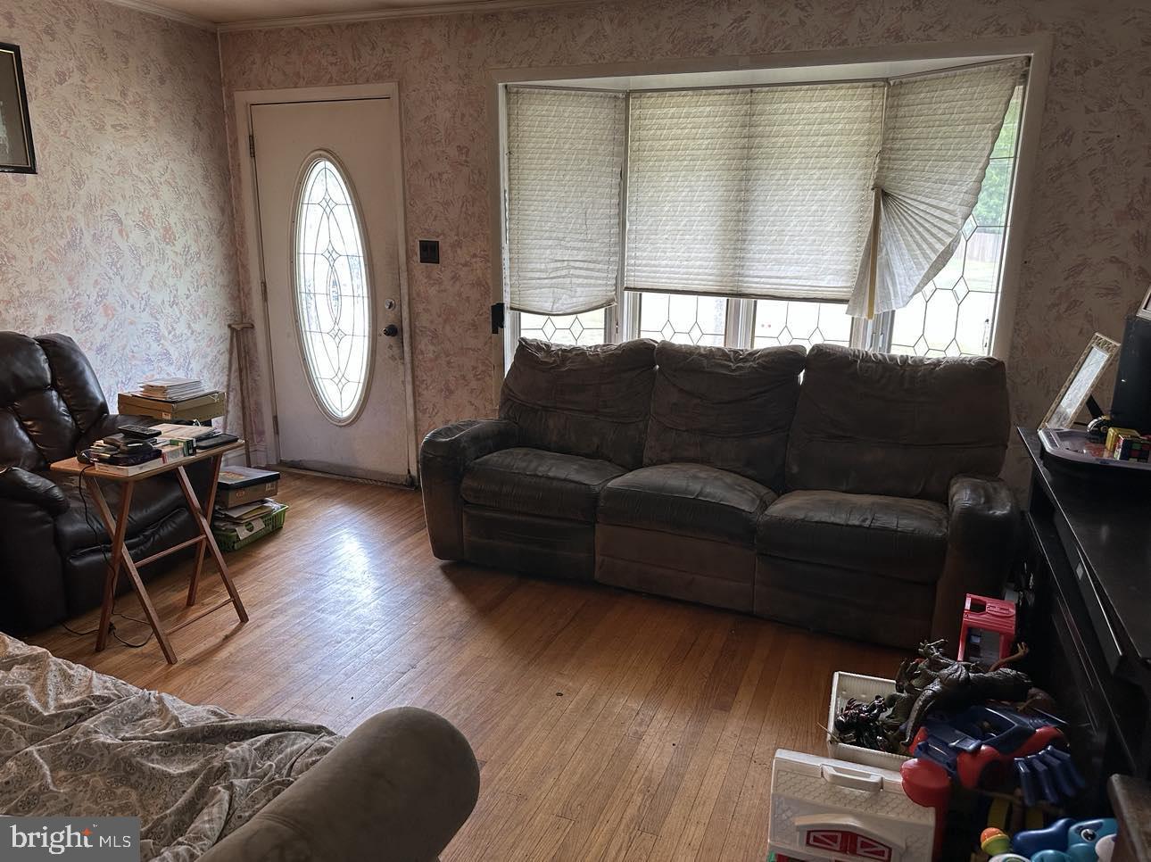 110 Centerton Road Bridgeton, NJ 08302 - Photo 3 of 21 a living room with furniture and a window