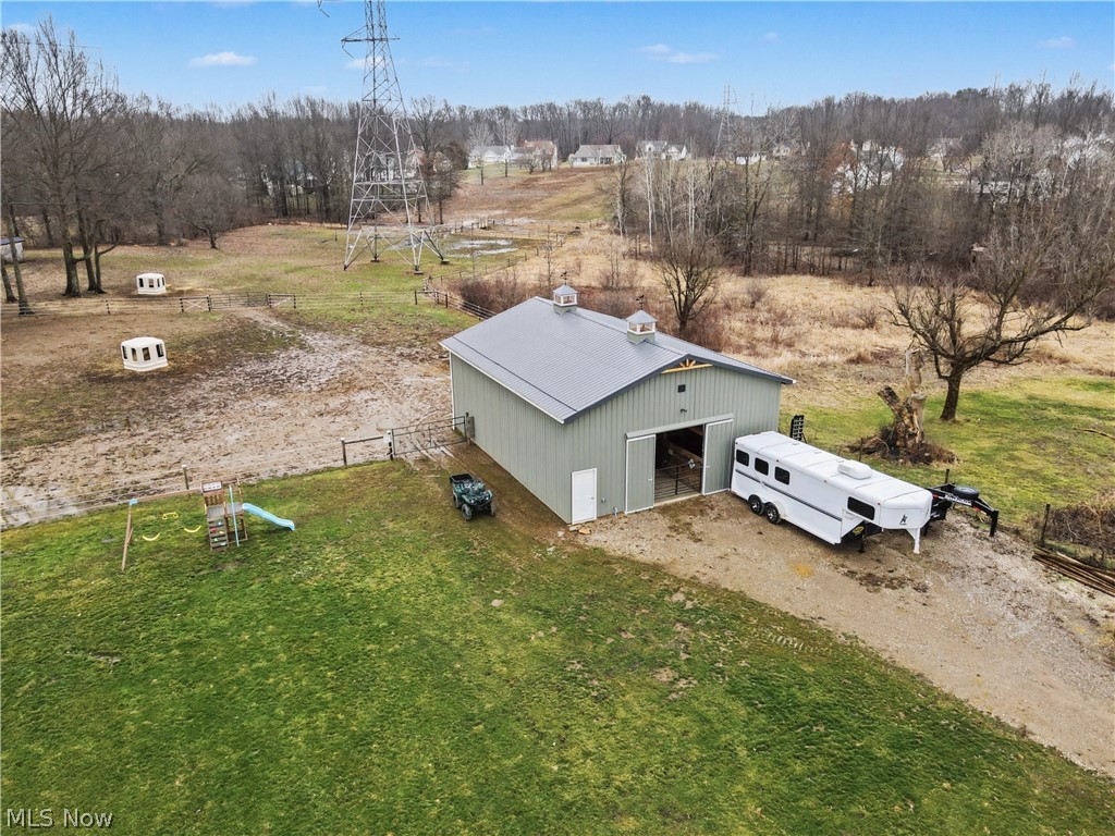 4556 Rootstown Road Ravenna, OH 44266 - Photo 40 of 50 Aerial view of a tree filled landscape