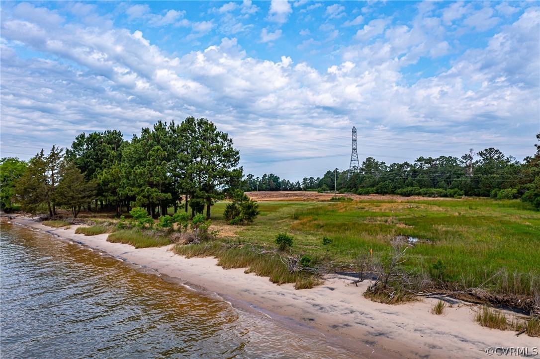 500 Accakeek Road Warsaw, VA 22572 - Photo 21 of 37 a view of a lake with a big yard