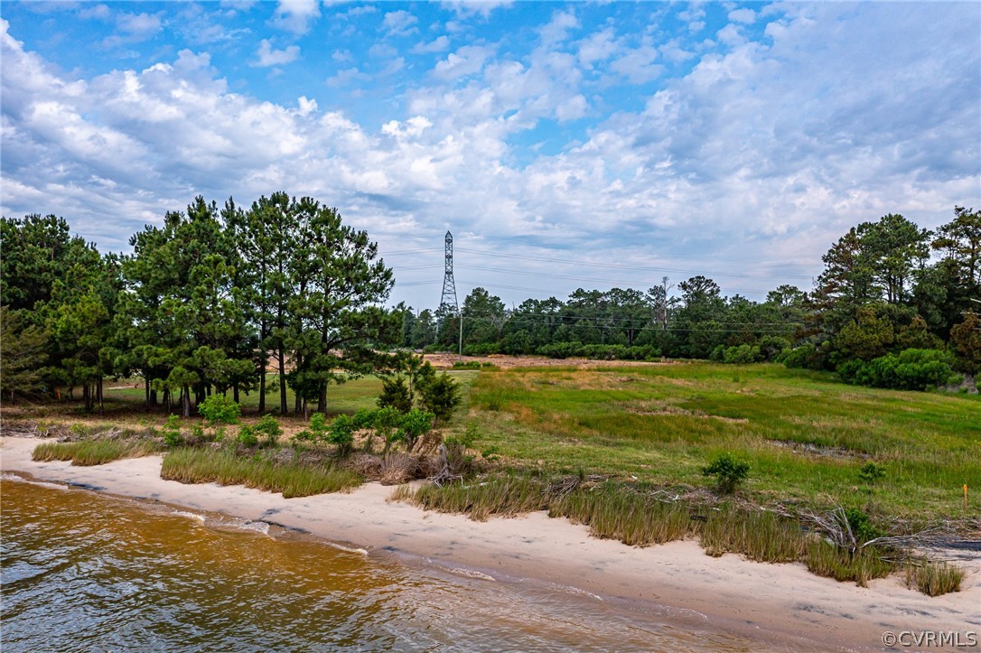 500 Accakeek Road Warsaw, VA 22572 - Photo 22 of 37 a view of a lake with houses in the background