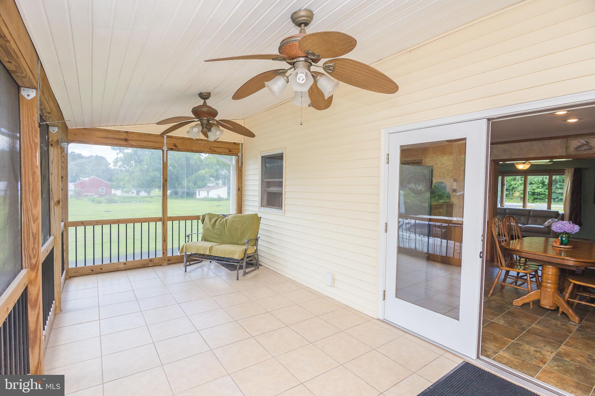 6830 McCabes Corner Road Snow Hill, MD 21863 - Photo 38 of 49 Enclosed screened porch with french doors