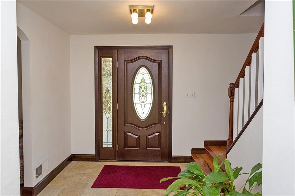 2225 Ramsey Road Monroeville, PA 15146 - Photo 4 of 25 The open foyer is host to a Pella window with beveled glass
