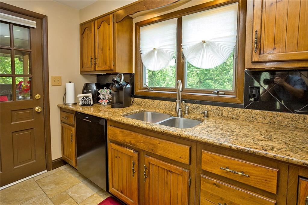 2225 Ramsey Road Monroeville, PA 15146 - Photo 10 of 25 The door in the kitchen leads to the huge deck