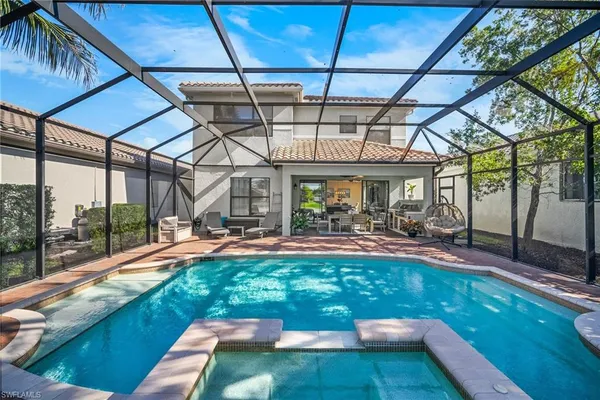 a view of swimming pool with a patio
