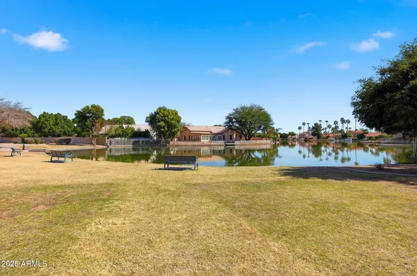 a view of a swimming pool and an outdoor space