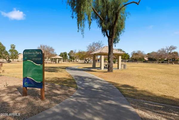 a view of a street with an outdoor space