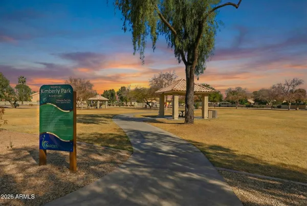 a view of a street with an outdoor space