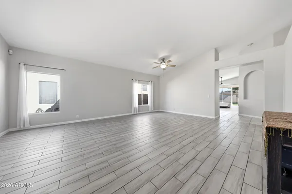 a view of livingroom with hardwood floor and hallway