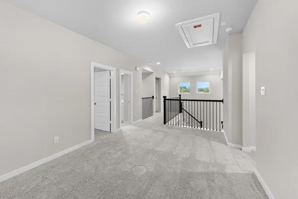 a white toilet sitting next to a bathroom sink