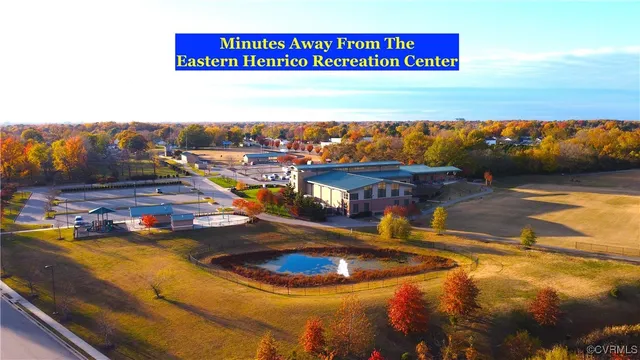 a view of a swimming pool with an ocean view