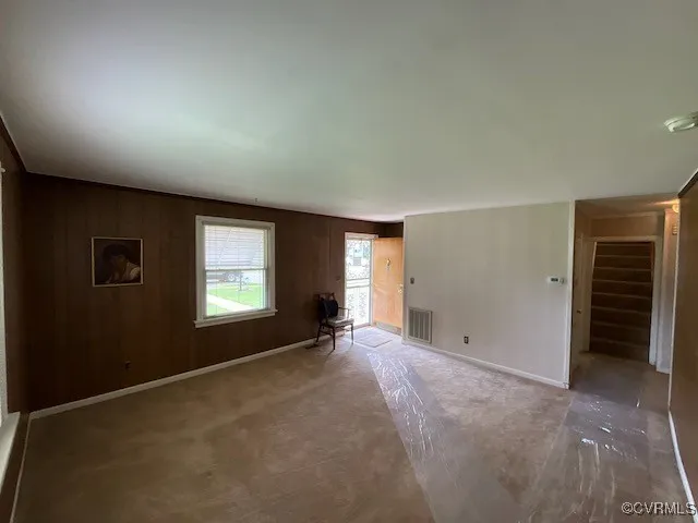 an empty room with windows