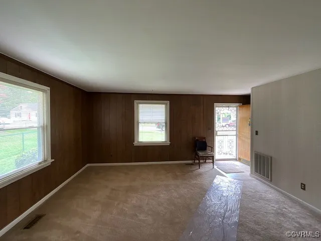 an empty room with windows
