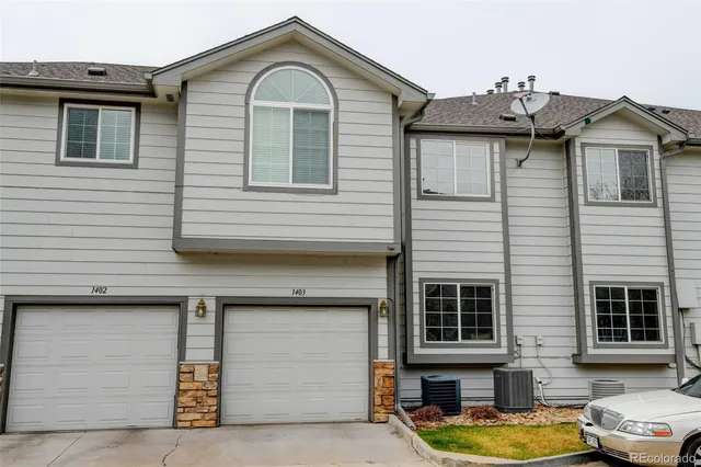 a view of a house with swimming pool