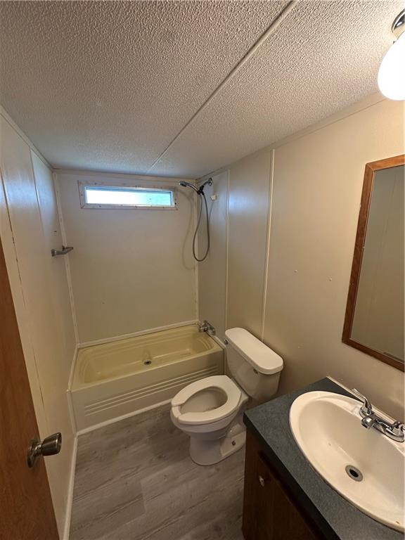 204-206 Cleveland Street Elco, PA 15434 - Photo 12 of 31 a bathroom with a granite countertop sink toilet and shower