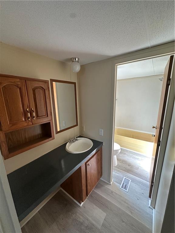 204-206 Cleveland Street Elco, PA 15434 - Photo 14 of 31 a bathroom with a double vanity sink and a mirror
