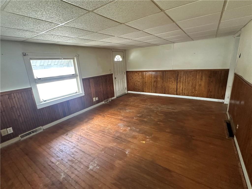 204-206 Cleveland Street Elco, PA 15434 - Photo 26 of 31 an empty room with wooden floor and windows