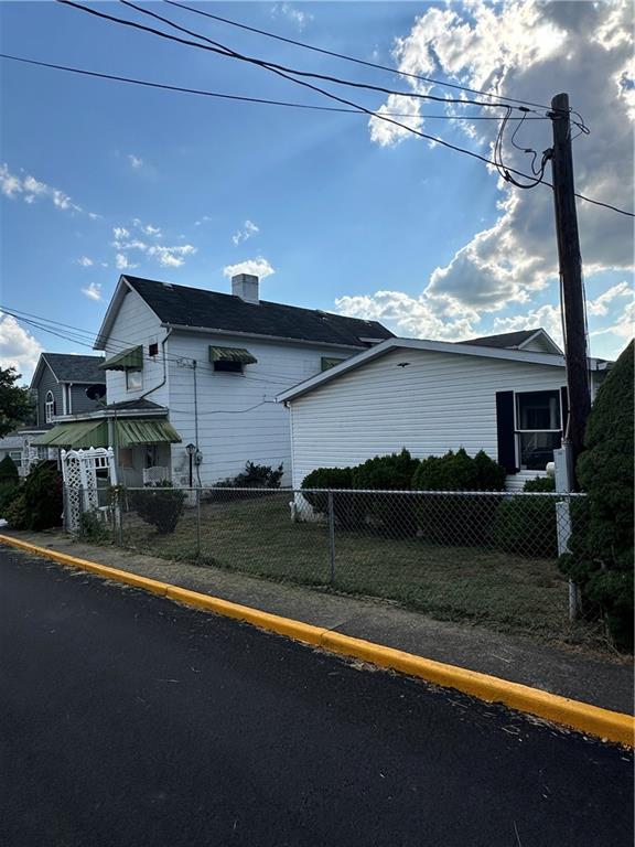 204-206 Cleveland Street Elco, PA 15434 - Photo 3 of 31 a view of a house with a yard