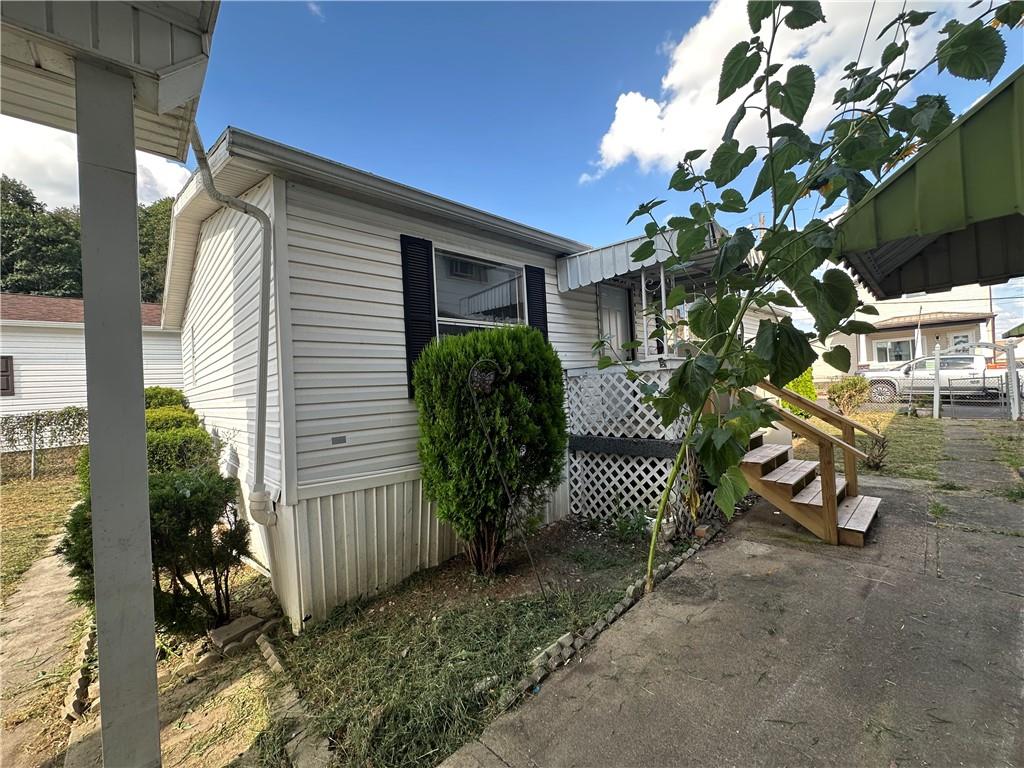 204-206 Cleveland Street Elco, PA 15434 - Photo 8 of 31 a view of a house with a garden