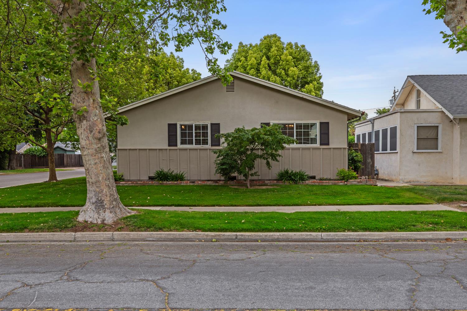 550 Bell Street Turlock, CA 95380 - Photo 4 of 36 a front view of house with yard and green space