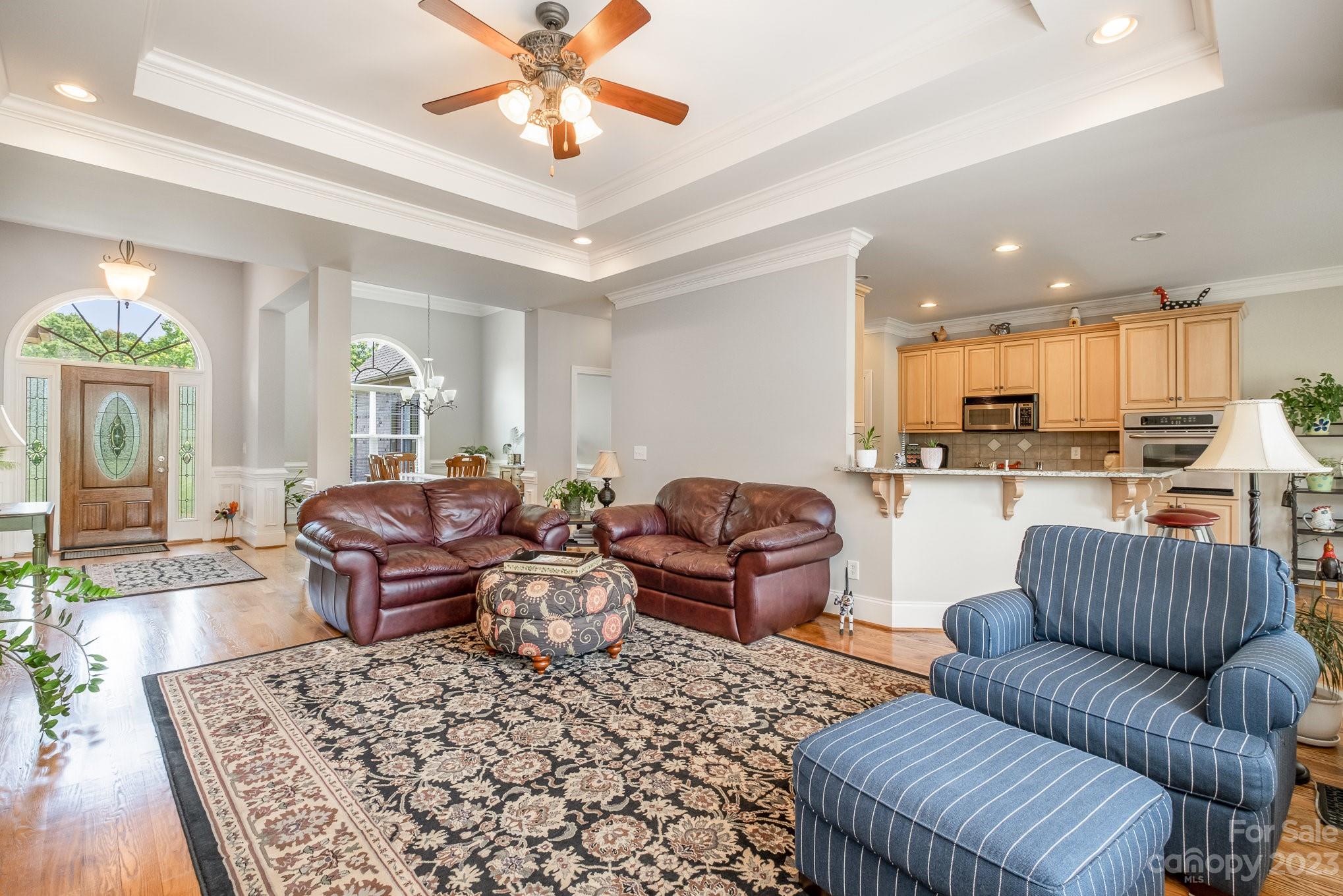 4733 Campobello Drive Monroe, NC 28110 - Photo 12 of 43 a living room with furniture kitchen view and a table