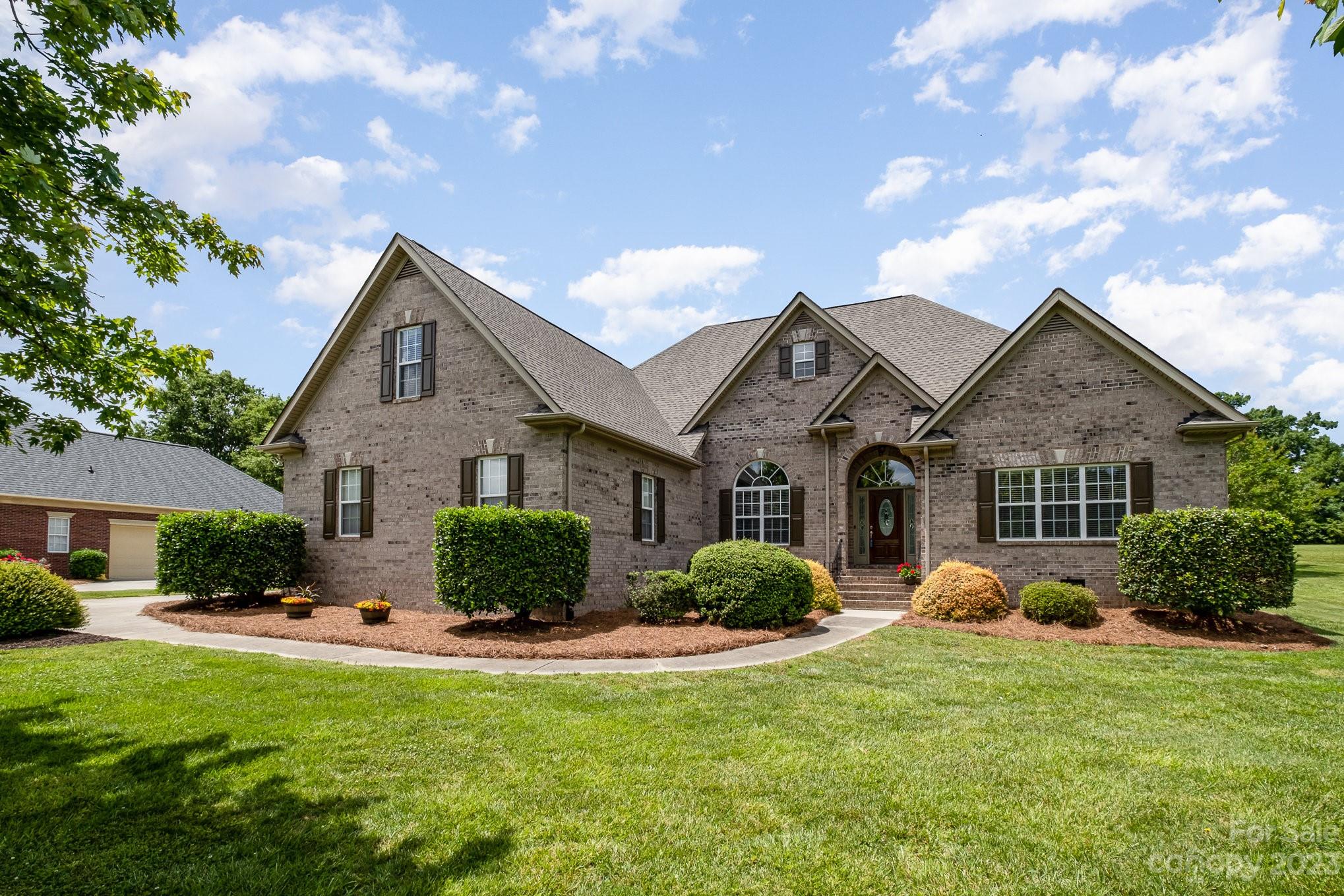 4733 Campobello Drive Monroe, NC 28110 - Photo 2 of 43 a front view of a house with a yard