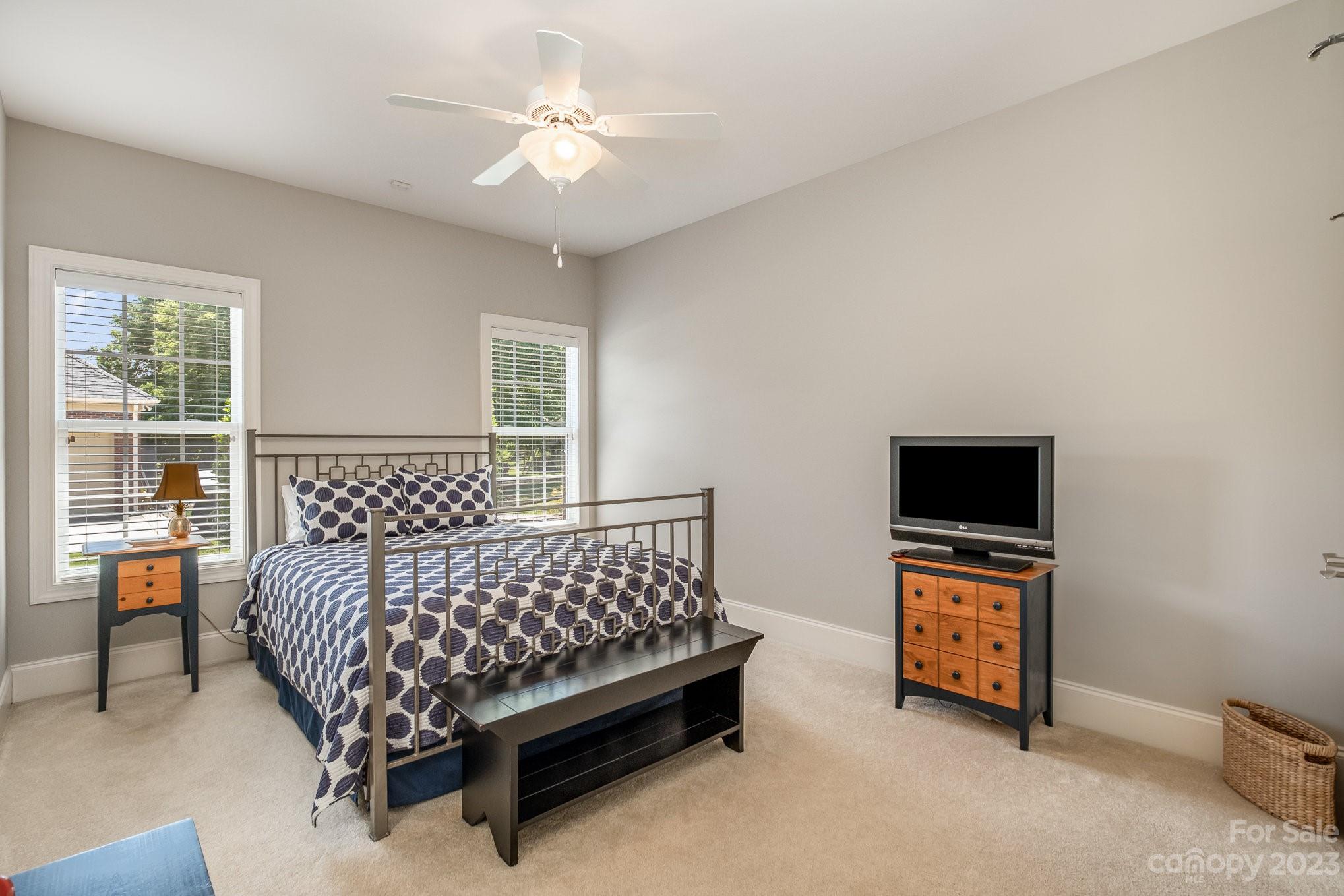 4733 Campobello Drive Monroe, NC 28110 - Photo 28 of 43 a bedroom with a bed and a tv