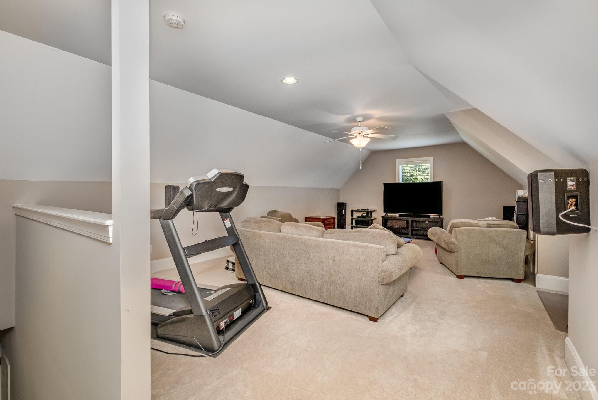 4733 Campobello Drive Monroe, NC 28110 - Photo 29 of 43 a living room with furniture and a flat screen tv