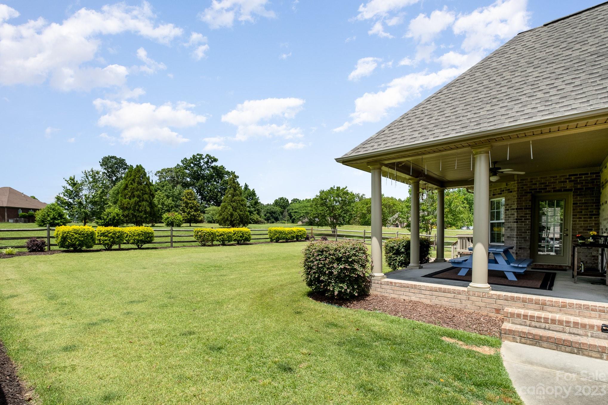 4733 Campobello Drive Monroe, NC 28110 - Photo 33 of 43 a view of a patio with swimming pool table and chairs