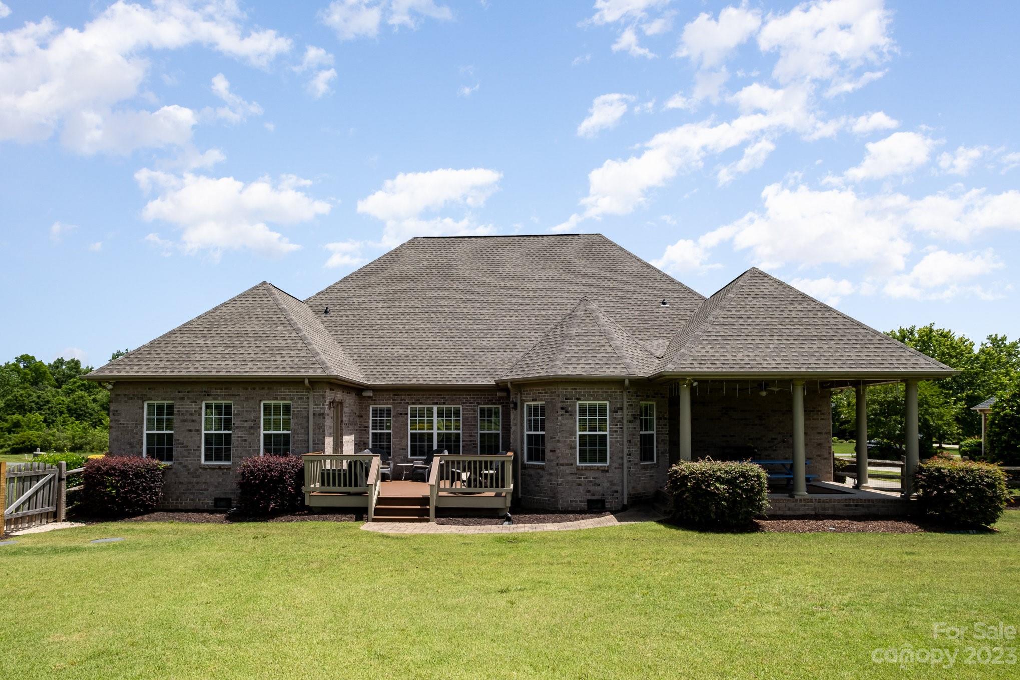 4733 Campobello Drive Monroe, NC 28110 - Photo 35 of 43 a view of a house with swimming pool and porch