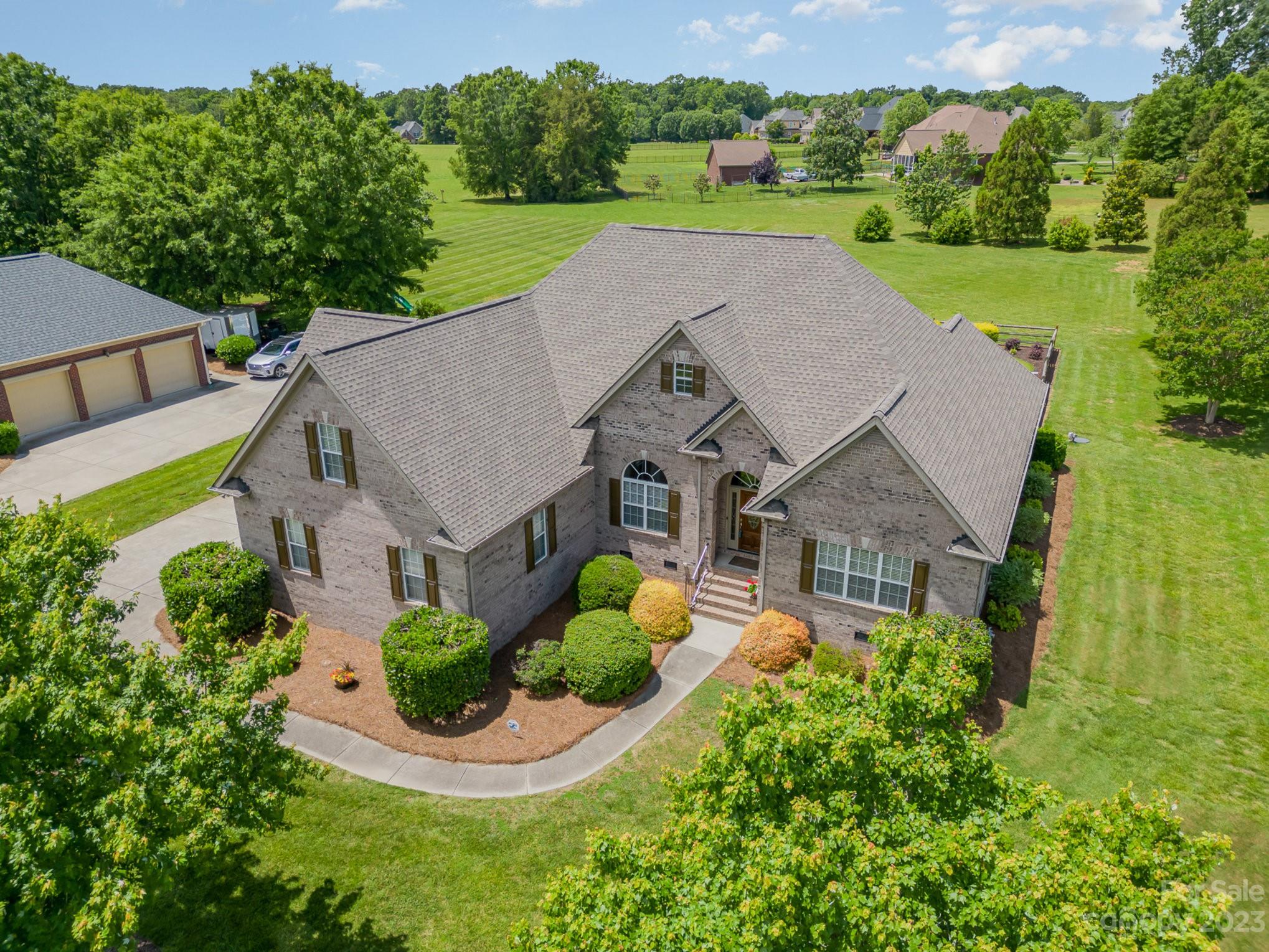 4733 Campobello Drive Monroe, NC 28110 - Photo 36 of 43 an aerial view of a house with garden space and street view